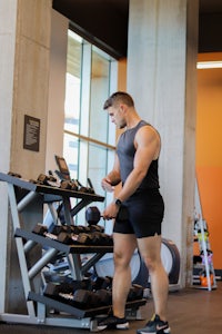 a man standing in a gym